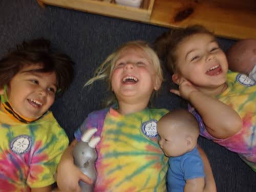 Montessori students wearing tie-dye Minithon tee shirts